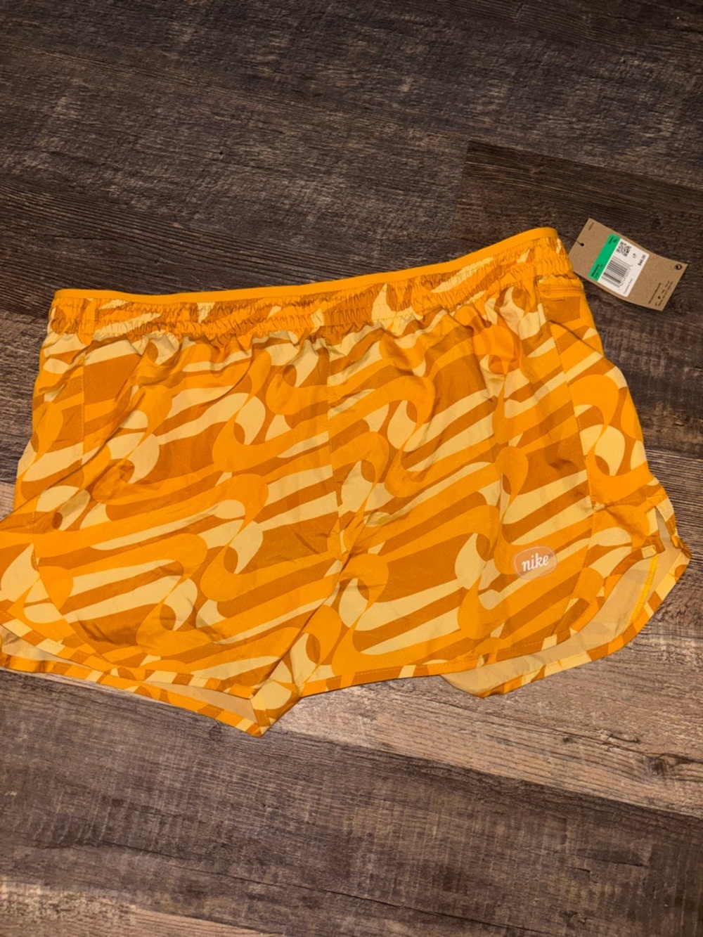 Nike Women’s Yellow-Orange Patterned Athletic Shorts